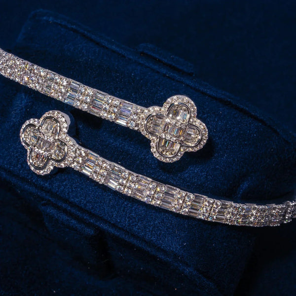 8MM Moissanite Iced Motif Baguette Bangle in 925 silver with white gold plating and VVS1 D color stones on blue velvet background