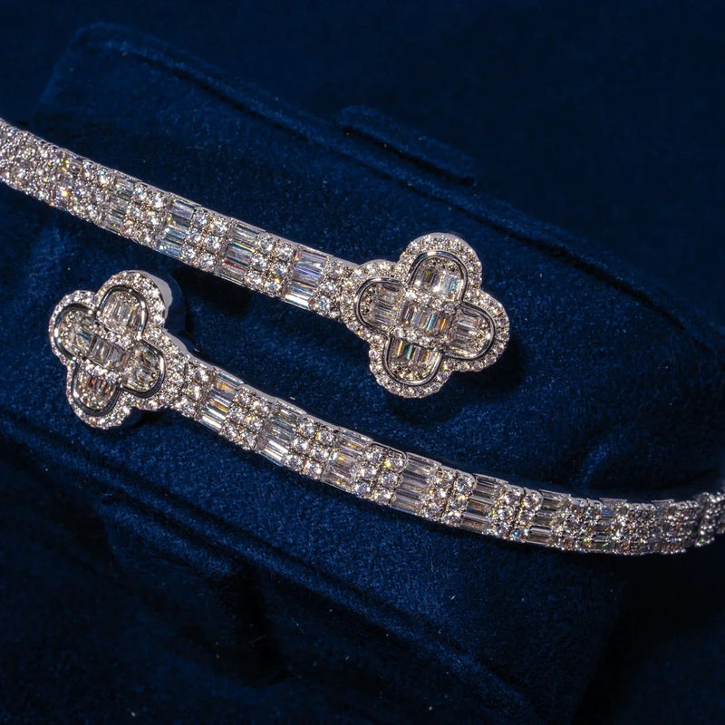 8MM Moissanite Iced Motif Baguette Bangle in 925 silver with white gold plating and VVS1 D color stones on blue velvet background