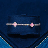 3MM moissanite pink motif tennis bracelet in 925 silver with D color VVS1 stones in a blue jewelry box