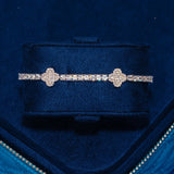 3MM Moissanite iced motif tennis bracelet in 925 silver with white gold plating and VVS1 D color stones in a luxurious blue velvet box