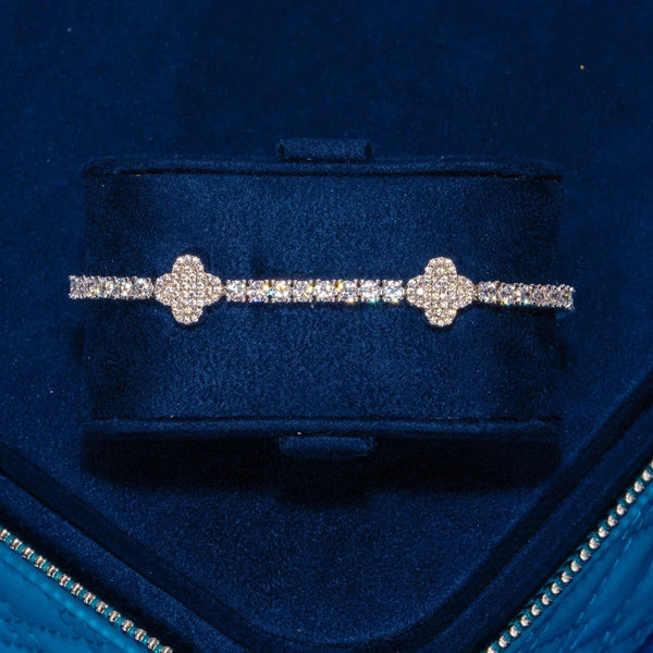 3MM Moissanite iced motif tennis bracelet in 925 silver with white gold plating and VVS1 D color stones in a luxurious blue velvet box