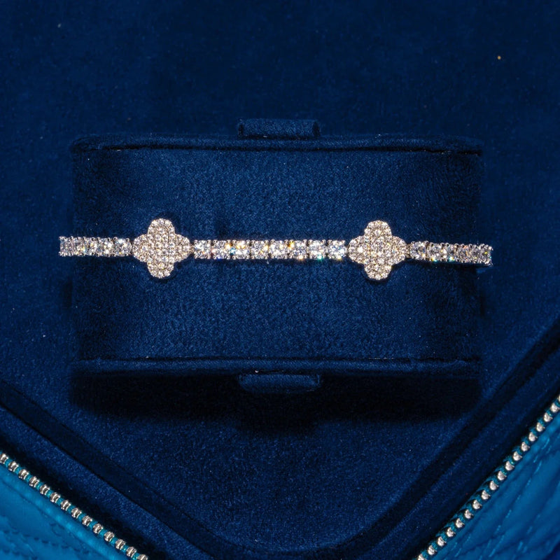 3MM Moissanite iced motif tennis bracelet in 925 silver with white gold plating and VVS1 D color stones in a luxurious blue velvet box