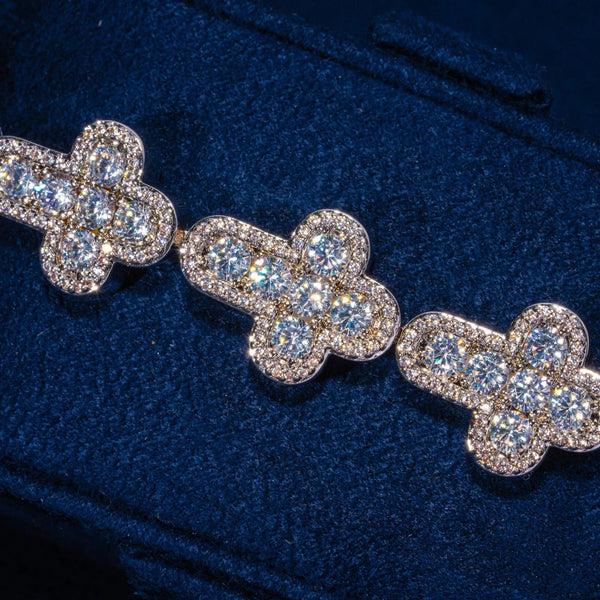 12.5MM Cross Tennis Bracelet white gold with CZ stones on dark blue fabric