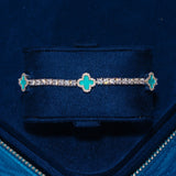 3MM Moissanite Green Motif Tennis Bracelet in 925 silver with green stones and diamond accents in a velvet box