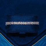 6MM Pear Cut Tennis Bracelet in white gold with sparkling stones in a blue jewelry box