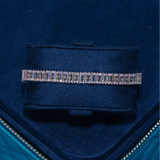 8MM Moissanite baguette tennis bracelet in 925 silver with D color VVS1 stones on blue velvet background