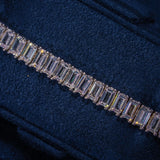 6MM Moissanite Baguette Tennis Bracelet in 925 Silver with D Colour VVS1 stones on dark fabric background