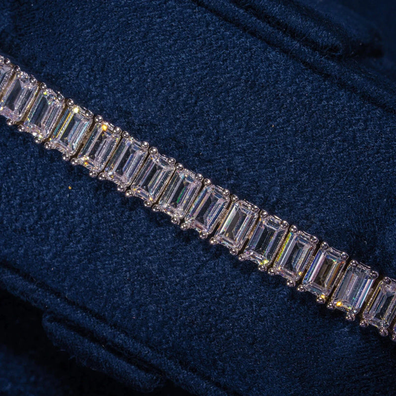6MM Moissanite Baguette Tennis Bracelet in 925 Silver with D Colour VVS1 stones on dark fabric background