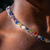 10MM multi gemstone chain in white gold with vibrant stones shining in natural light.