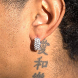 Moissanite 3-row hoop earrings in 925 silver with D colour VVS1 stones worn on ear