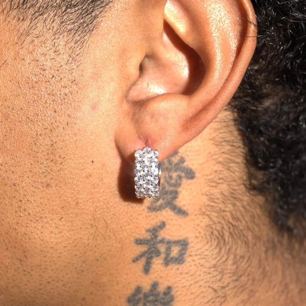 Moissanite 3-row hoop earrings in 925 silver with D colour VVS1 stones worn on ear