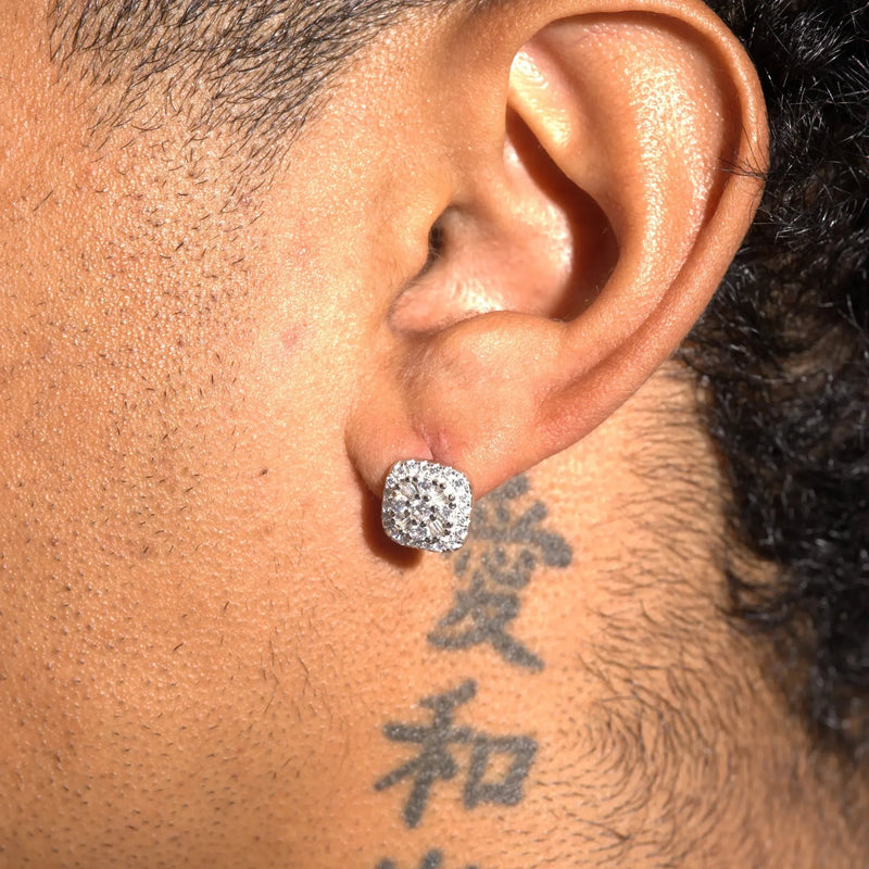 Moissanite 10MM baguette square stud earrings in 925 silver worn on ear with tattoo background