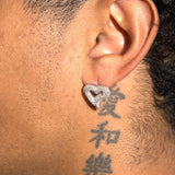 Close-up of ear wearing a Moissanite S925 Heart Earring in white gold plating with VVS1 D colour stones