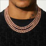 13mm Cuban chain in rose gold with diamond simulants worn on neck