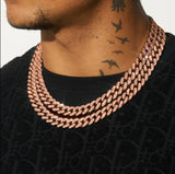 13mm rose gold Cuban chain necklace with diamond simulants worn on neck