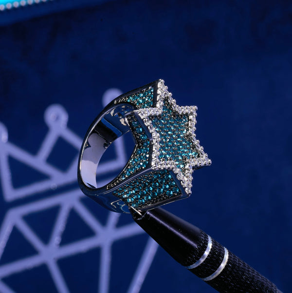 Blue Iced Star Ring in white gold with blue and clear stones.