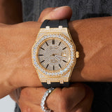 44mm gold moissanite diamond watch with black silicone band on wrist