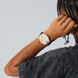 44mm paved VVS moissanite gold watch with silicone band on wrist