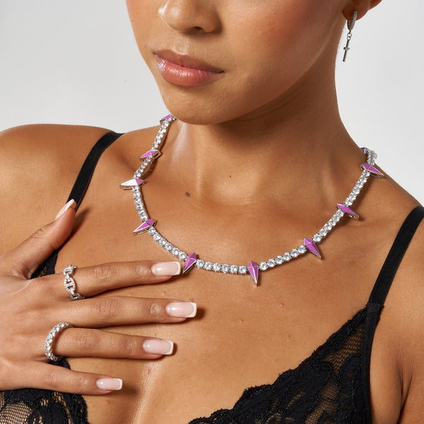 5mm pink pave spike tennis chain in white gold shown on model, featuring round cut stones and pink enamel accents.