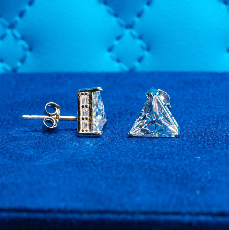 Moissanite Triangle & Baguette Cut stud earrings set in 925 silver with VVS1 clarity on blue background
