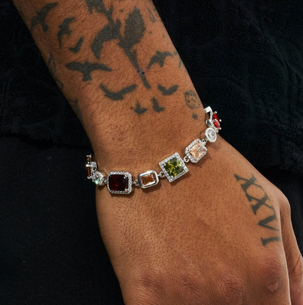 10MM multi gemstone bracelet in white gold with hand-set stones on tattooed wrist.