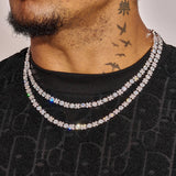 Close-up of a man wearing a sparkling 5MM XOXO Chain in white gold with diamond simulants