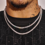 White gold Broken Heart Chain necklace with diamond simulants worn on neck