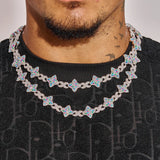 Moissanite multicolor star infinity chain necklace in 925 silver with VVS1 clarity and D color, worn on neck