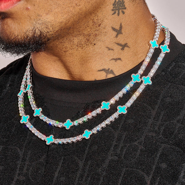 5MM Moissanite Green Motif Tennis Chain in 925 Silver with D Colour VVS1 stones on male model wearing black shirt