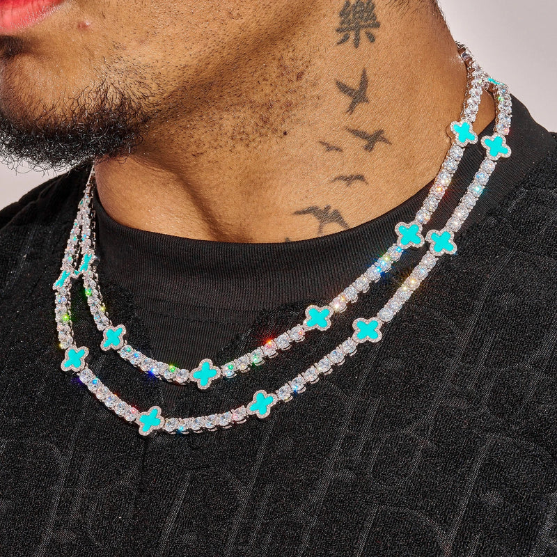 5MM Moissanite Green Motif Tennis Chain in 925 Silver with D Colour VVS1 stones on male model wearing black shirt