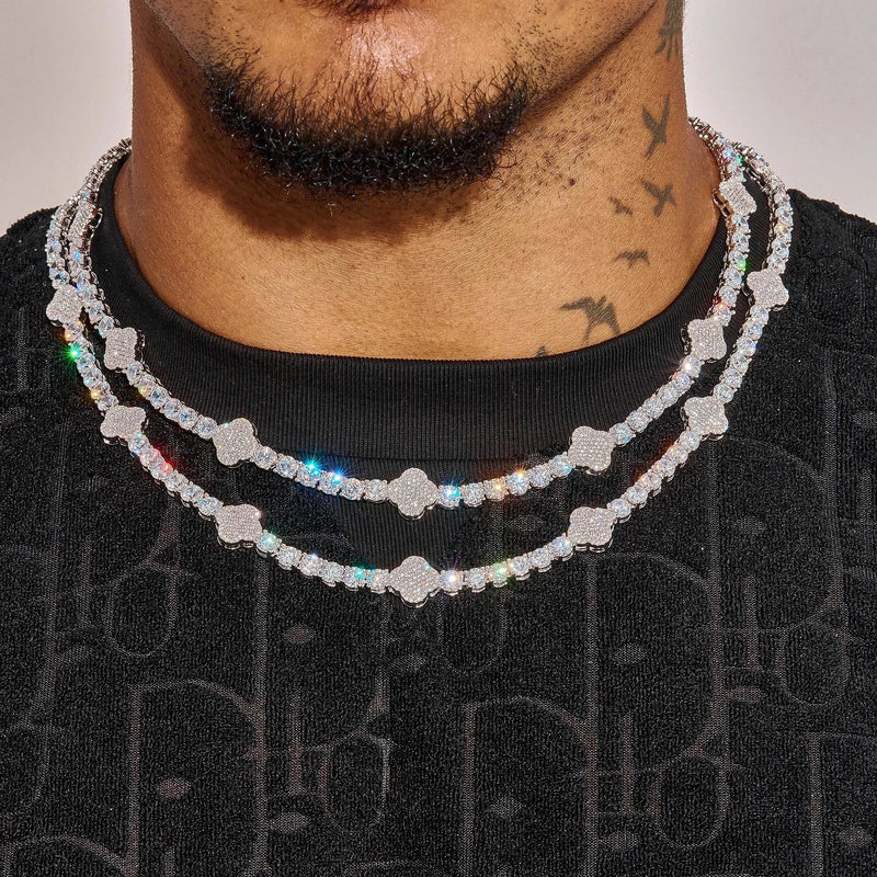 Close-up of 5MM Moissanite Iced Motif tennis chain in white gold plating on men's neck