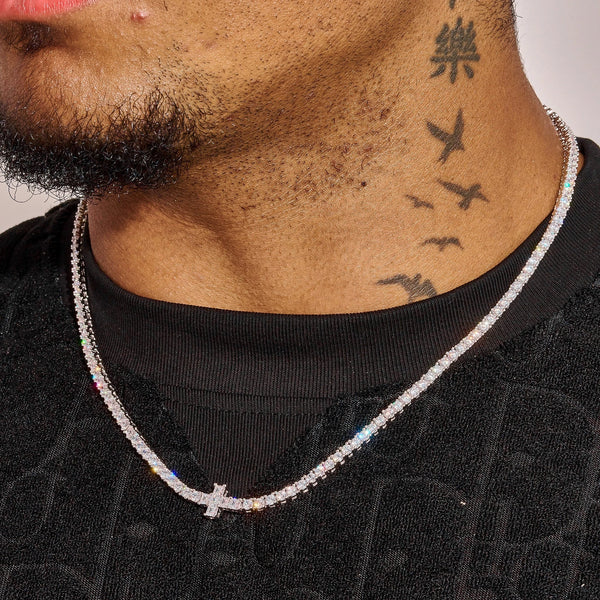 3MM Tennis Cross Chain in white gold with diamond simulants worn around neck