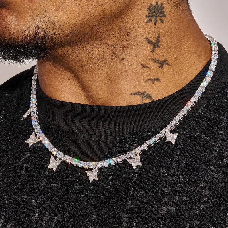 Iced Butterfly Tennis Chain in white gold with sparkling diamond simulants and butterfly accents worn on neck