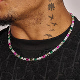 5MM Moissanite multicolor mixed oval cut tennis chain necklace on model with tattooed neck