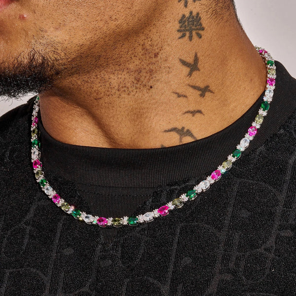 5MM Moissanite multicolor mixed oval cut tennis chain necklace on model with tattooed neck