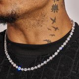 6MM Round and Diamond Cluster Tennis Chain in white gold worn on neck showcasing sparkling stones and clusters