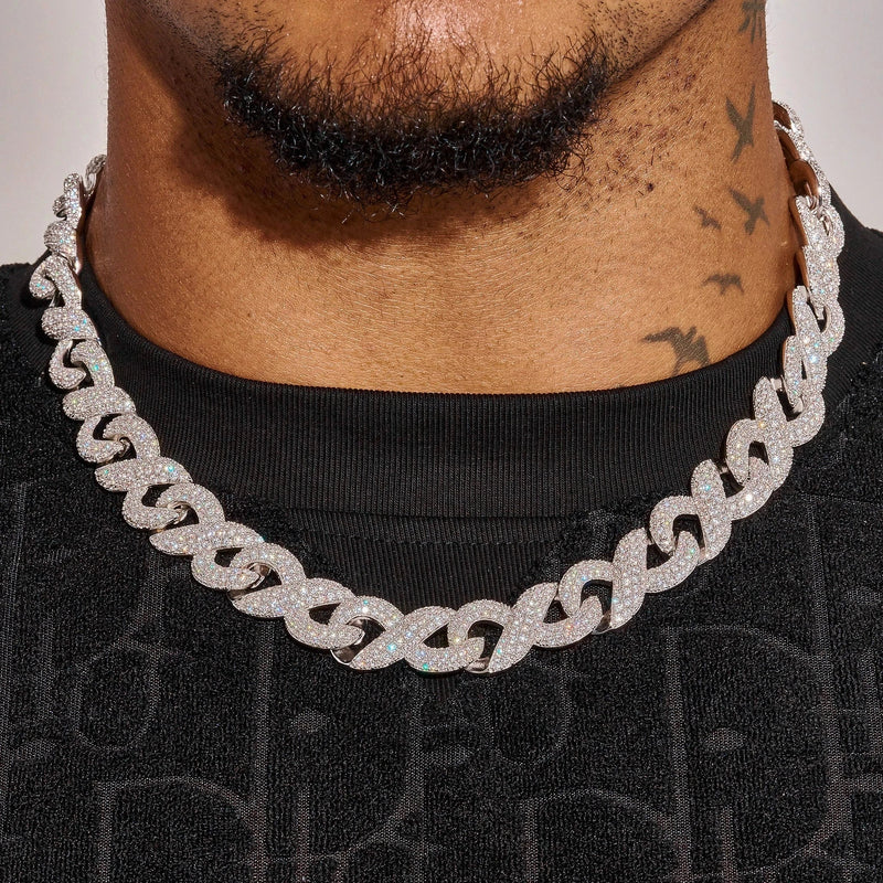 14MM iced out figure 8 link chain in white gold with diamond simulants worn on neck