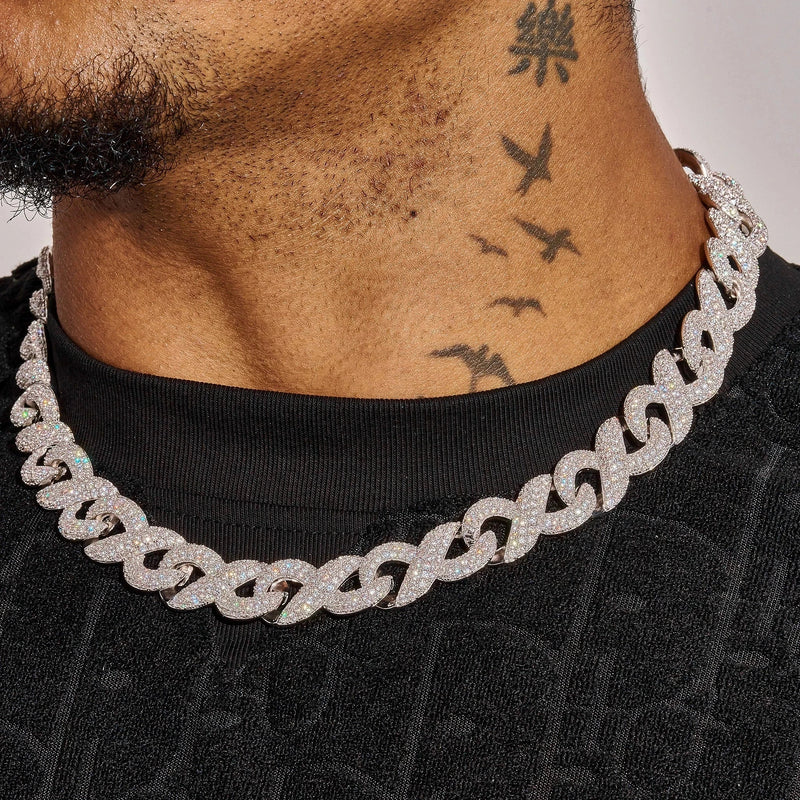 14MM iced out figure 8 link chain in white gold with radiant stones worn on neck