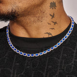 Sapphire Cushion Cut Tennis Chain white gold necklace with deep blue sapphires on model