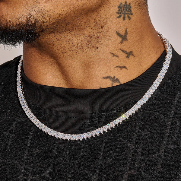 6MM Pear Cut Tennis Chain in white gold with sparkling stones worn on man's neck