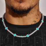 Close-up of 5MM Moissanite Blue Clover Tennis Chain with turquoise clover-shaped stones on a male neck
