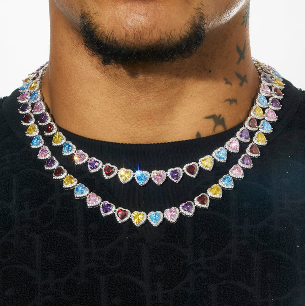 10MM multi gemstone & white heart chain in white gold on person.