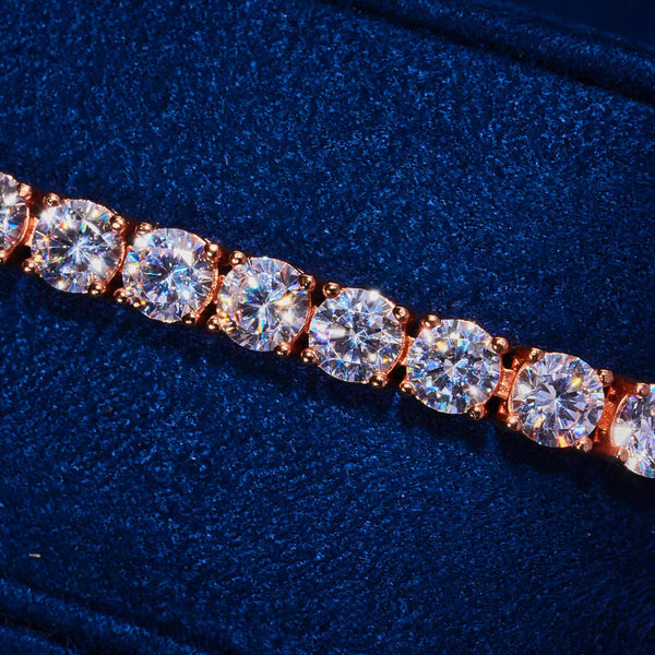 5mm Moissanite tennis bracelet in rose gold with 925 silver and round-cut stones on blue velvet background