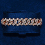 14mm two-tone Monaco bracelet with hand-set diamond simulant stones in gold plating displayed on navy velvet background