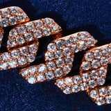 Close-up of 14mm Moissanite Monaco Bracelet in rose gold with sparkling stones on dark background