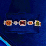 10MM Multi Gemstone Bracelet in white gold with hand-set prong-lifted colorful gemstones and diamond simulants