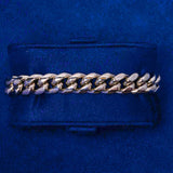 10mm Cuban iced clasp bracelet in white gold with polished Cuban links and diamond simulant stones on clasp