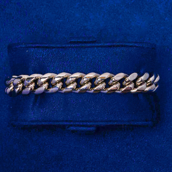 10mm white gold Cuban bracelet on blue background with polished links and lifetime warranty