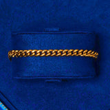 6mm Cuban bracelet in gold plating on blue velvet display case