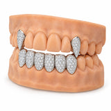 Silver moissanite lower set with upper canine fangs, side profile